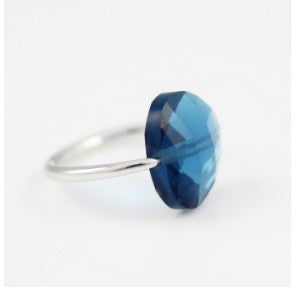 Rene Signature silver ring with a blue stone